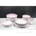 Reactive glazed stoneware dinner set with pink rim